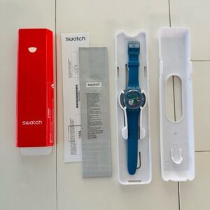 Brand New Swatch SUON102 Blue Skeleton Gent Watch in Box